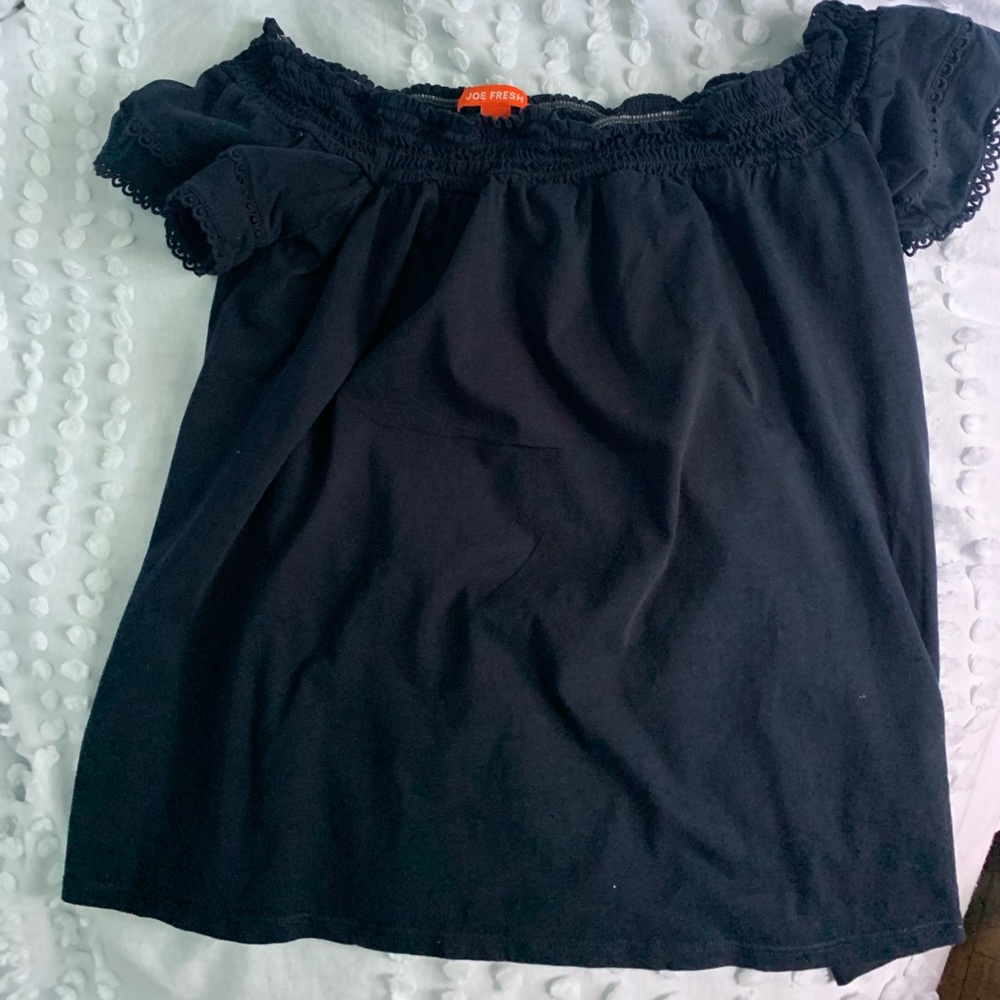 Off shoulder. Blue t-shirt